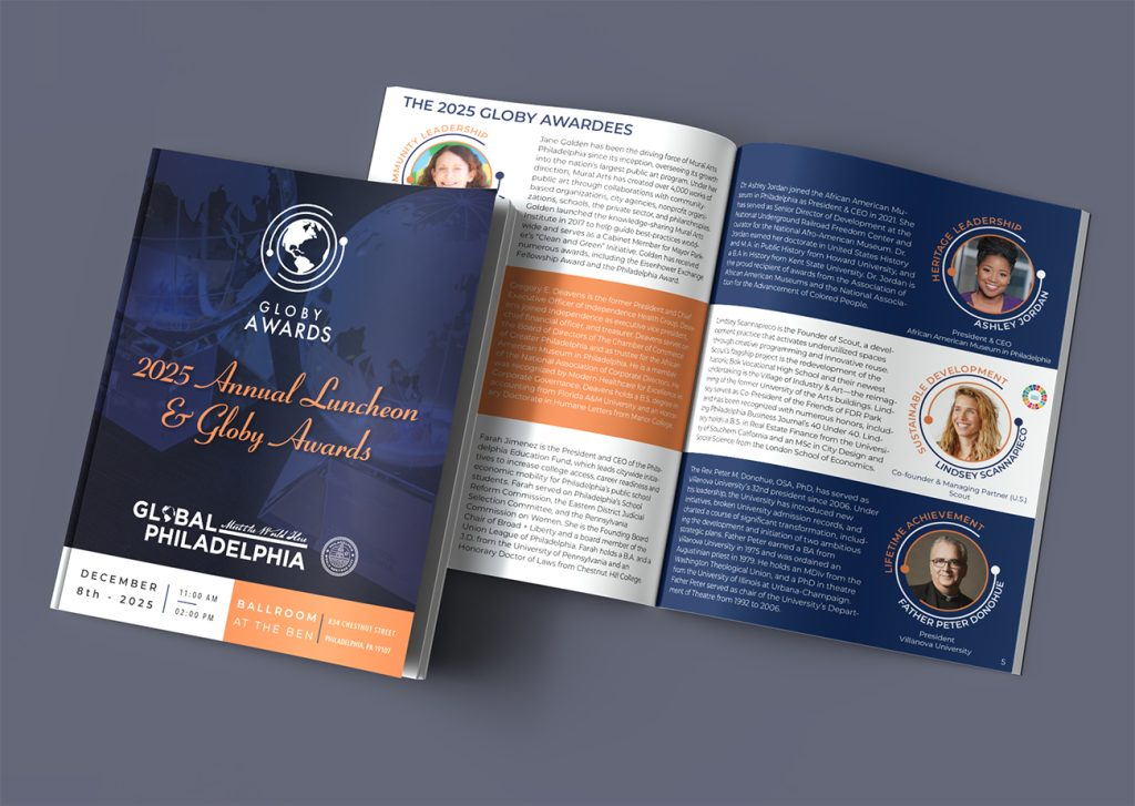 Mockup containing 2 overlapping views of a program booklet, one closed, showing the cover, and one open, showing a spread. The cover features a closeup photo of two crystal globe-shaped awards in shades of navy blue with event details in white and orange. The spread features six color blocks, each with a photo of an award winner and a paragraph of biographical information.