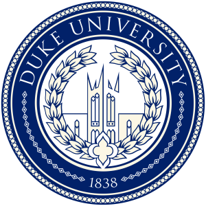 Duke University seal, which is a royal blue ring bordered with tiny repeating rings. WIthin the border is a geometric outline of a building with pointy spires, surrounded by a floral wreath.