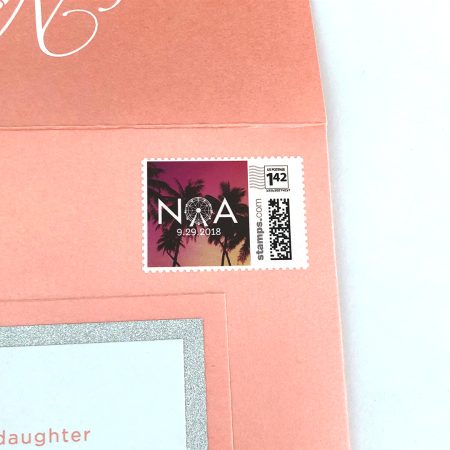 Detail of custom stamp with logo on bat mitzvah invitation.